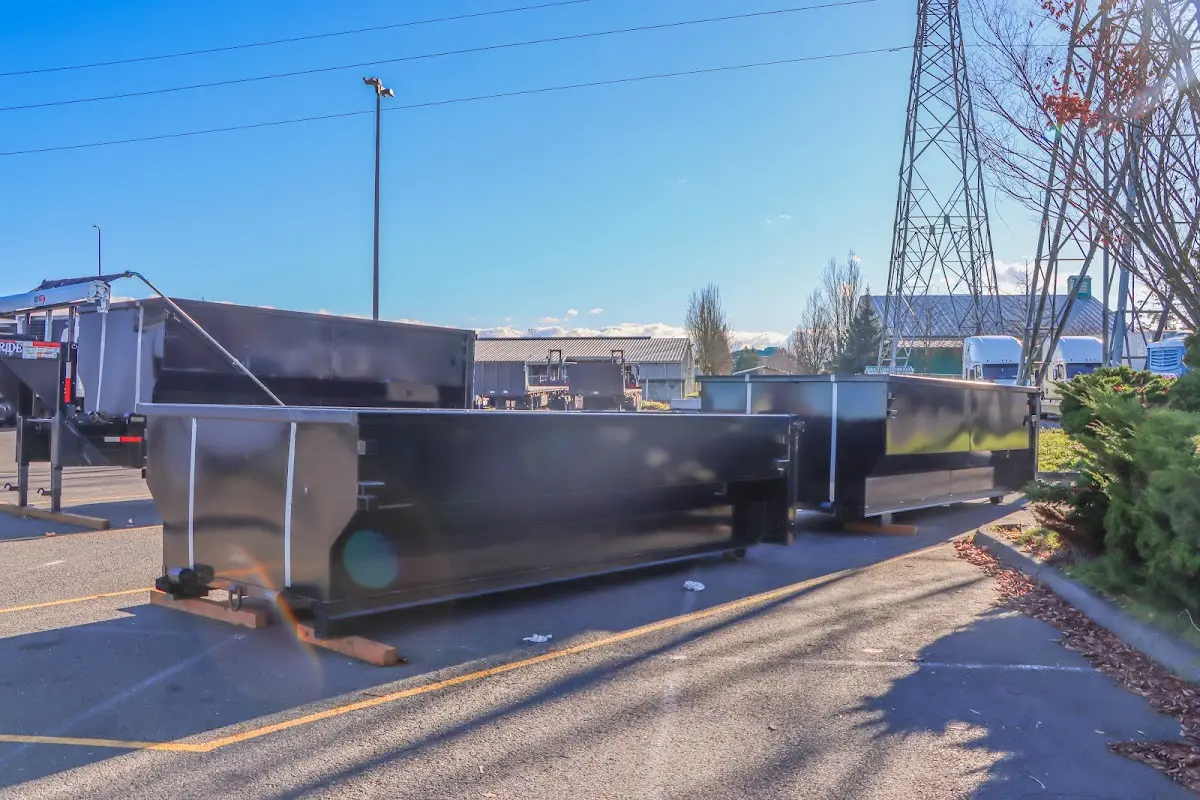 Roll-off dumpster ready for waste disposal at job site for 2 Yard Dumpster Rental in Roxboro